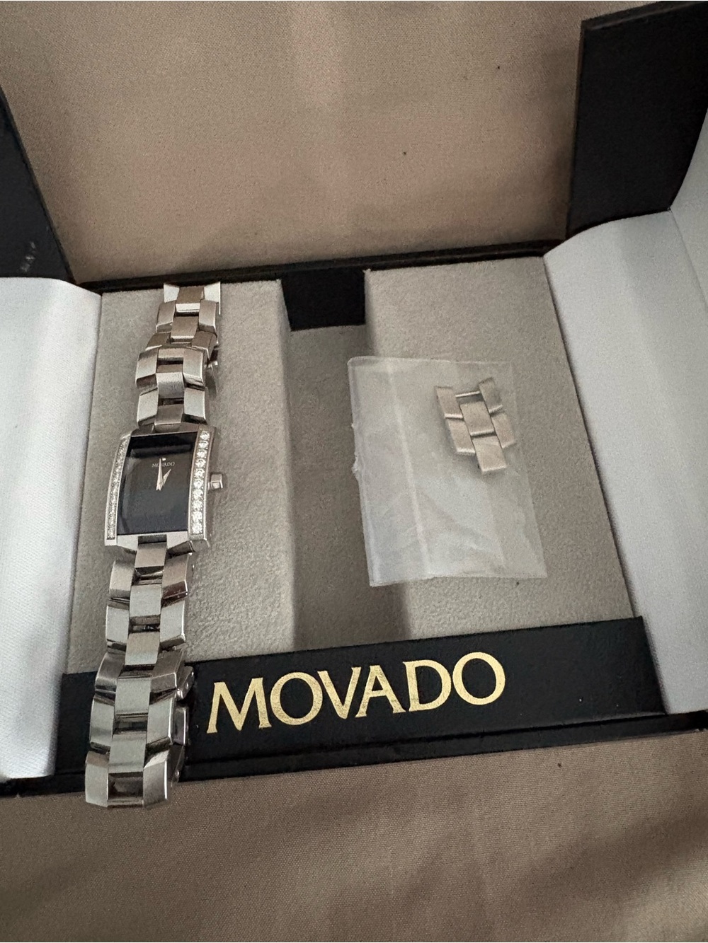 Movado Sterling Silver Watch with Rectangular sapphire crystal dial & diamonds
